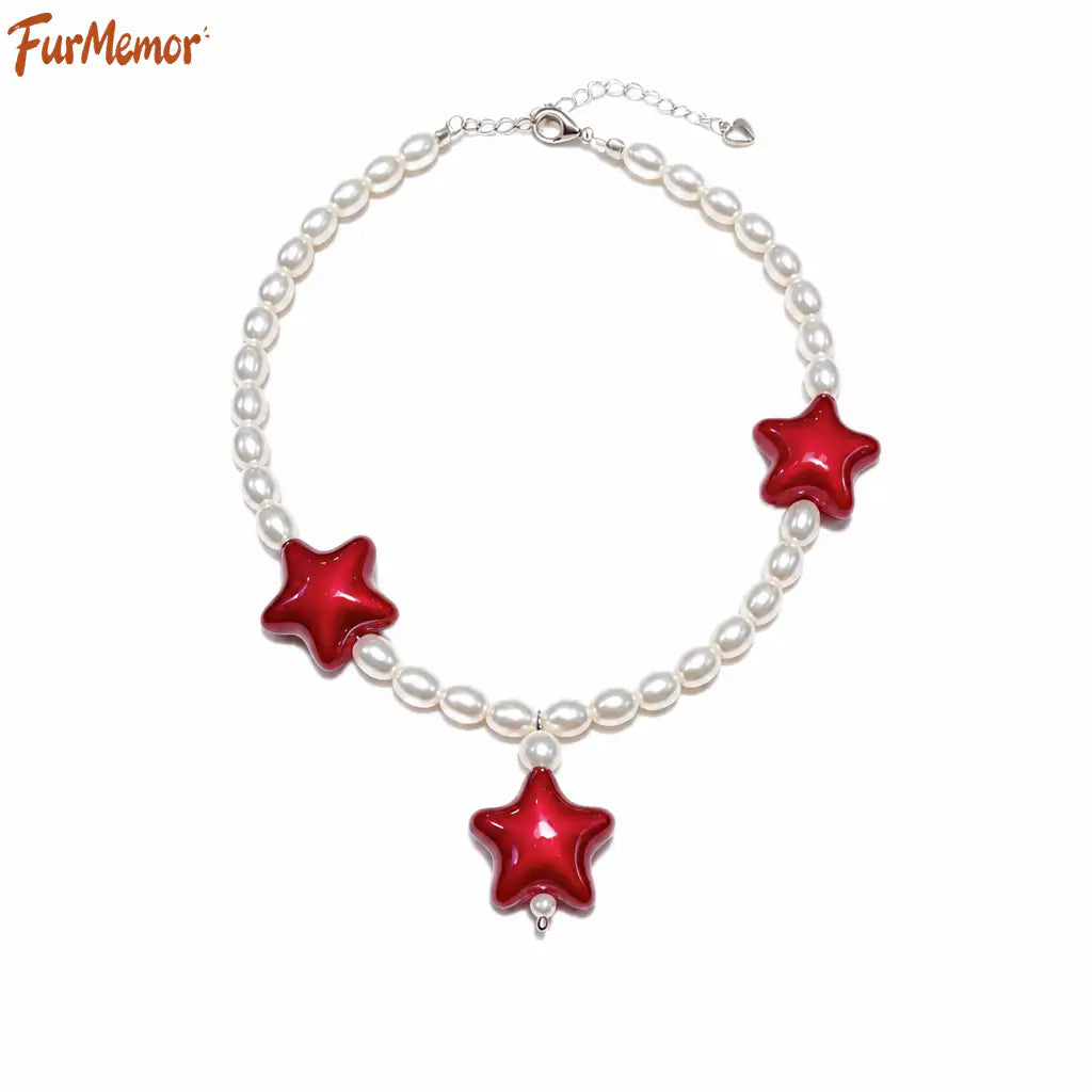 Pearl pet necklace with a red star pendant